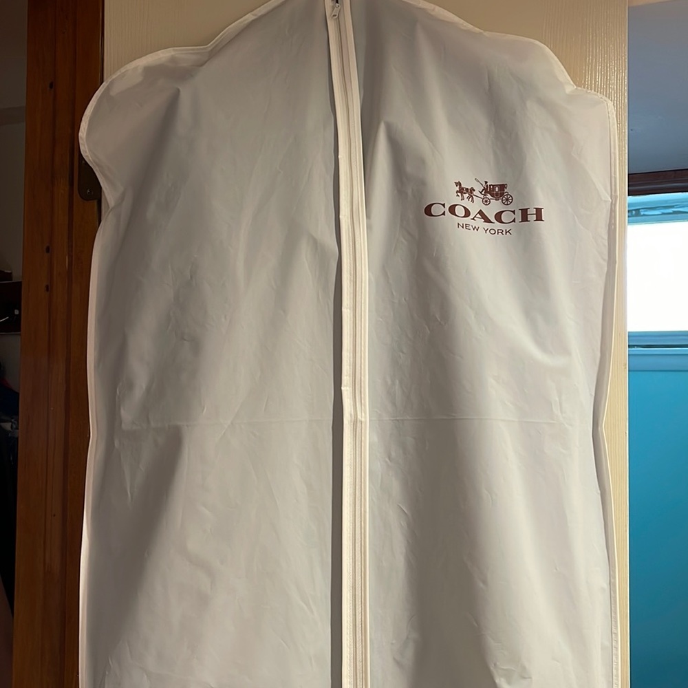 Coach coat dust covering